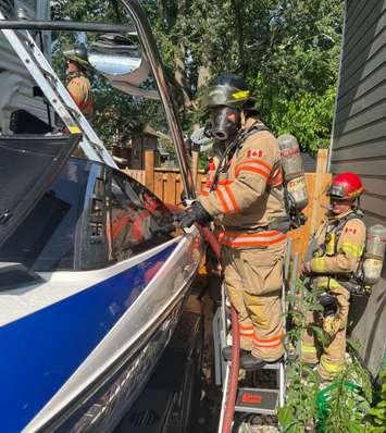 Firefighters were called to a boat fire in a driveway on Woodman Avenue, July 27, 2023. Photo courtesy of the London Fire Department.