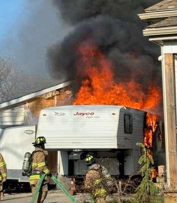 Firefighters work to extinguish a camper trailer fire, April 25, 2024. Photo provided by the St. Thomas Fire Department.