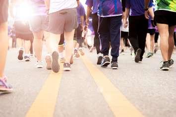 Group walking together (Image courtesy of sataporn_chayawan/	iStock / Getty Images Plus via Getty Images)