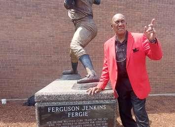 Fergie Jenkins poses alongside his statue outside of Chatham's Civic Centre. Photo by 
Cheryl Johnstone.