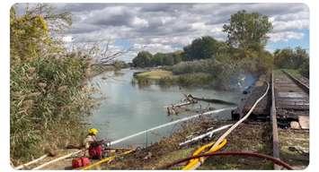 Fire at Running Creek Road in Wallaceburg (Image captured from Chatham-Kent Fire and Emergency Services video via X)