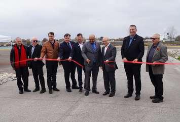 Cestar’s Chief Operating Officer Adrian Sharma is joined by local officials to snip the ribbon celebrating the completion of the Cestar Dock at Sarnia Harbour. October 31, 2024 Blackburn Media photo by Melanie Irwin.