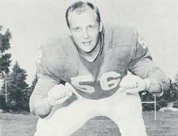 Joe Schmidt in a 1961 promotional photo. Public domain.