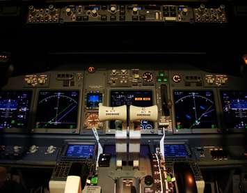 Flight deck of a modern airliner at night (Boeing 737-800 Next Generation). Photo courtesy of © Can Stock Photo / FER737NG