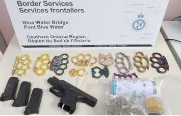 Brass knuckles and a firearm were seized at the Blue Water Bridge. April 2024. (Photo courtesy of CBSA via X, formerly Twitter)