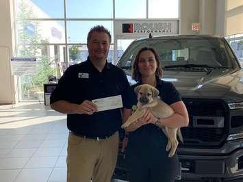 Victory Ford in Chatham donates a $400 cheque to Pet and Wildlife Rescue. (Photo courtesy of PAWR via Facebook)