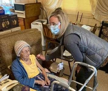 Lambton's Mobile Immunization Team administered the first vaccination to a client who is homebound - Apr 22/21 (Photo courtesy of Lambton Public Health via Twitter)