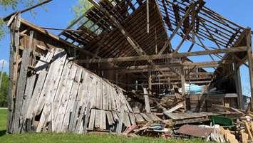 A barn damaged by a one of two microbursts that struck southwestern Ontario, May 7, 2024. Photo provided by the Northern Tornadoes Project. 