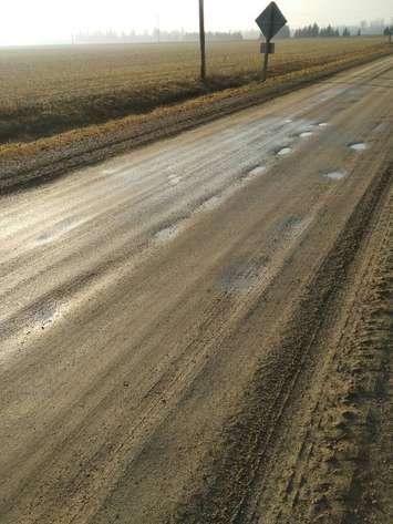Road damage caused by vehicles that exceed the half-load restriction. (Photo courtesy of Miguel Pelletier.)