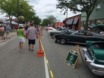 People and classic cars line the streets at the 27th annual Wallaceburg Antique Motor and Boat Outing, August 8, 2015. (Photo by the Blackburn Radio Summer Patrol)