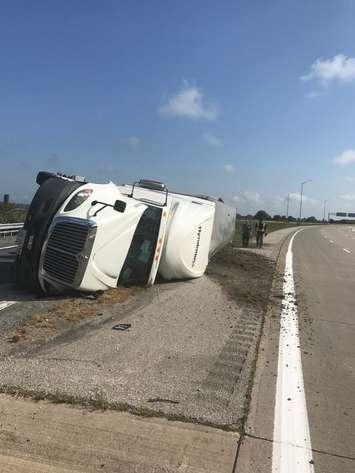 The scene after a transport truck rolled over on an on-ramp to the Hwy. 401 near Tilbury. August 30, 2016. (Photo courtesy of Essex County OPP)