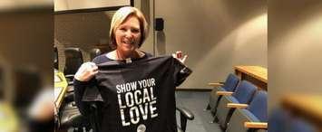 Councilor Carmen McGregor displays her Chatham-Kent United Way shirt after her motion passes on December 10, 2018. (Photo by Allanah Wills)