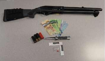 Police seize drugs and a sawed-off shotgun following a search on Walpole Island First Nation. December 20, 2021. (Photo courtesy of Lambton OPP)