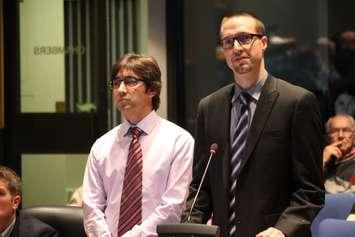 The MTO's Paul Santos (left) and IBI Group Associate Scott Johnston speak in front of Chatham-Kent Council, November 23, 2015 (Photo by Jake Kislinsky)