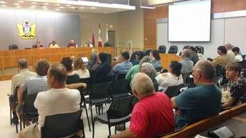 A crowd listens as the Leamington appeals committee holds a hearing on taxi licencing at council chambers, Leamington Municipal Building, August 21, 2017. Photo by Mark Brown/Blackburn News.