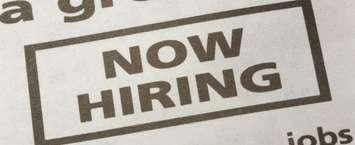Now hiring ad in newspaper. (File photo courtesy of © Can Stock Photo)