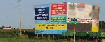 A billboard recently put up at Kent Bridge Rd. and Countryview Line with and offensive message to the gay community. Aug. 23, 2018. (Photo by Greg Higgins)