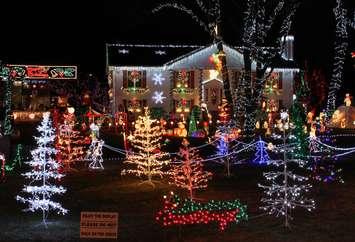 Christmas lights displayed on a house. Google image labeled for reuse.