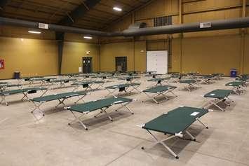 Cots are lined up at the Bradley Convention Centre in Chatham, set up as an evacuation centre for those displaced by flooding on February 23, 2018. Photo by Mark Brown/Blackburn News.