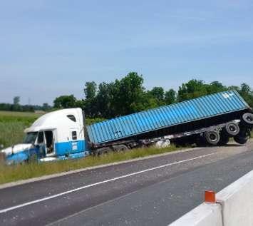 Transport truck crash on Hwy. 401 near Victoria Rd. (Photo courtesy of OPP West/ via Twitter).