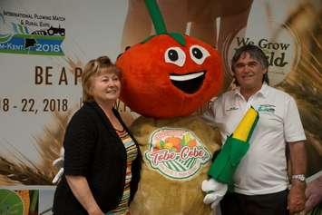 Lucille and Jean Marie Laprise, along with IPM 2018 mascot Tobe Cobe Jr., 
during an donation night on June 13, 2019 at the banquet hall of the Ken Houston Memorial Agricultural Centre in Dresden.  The couple lent the CK community their farmland for the 2018 IPM. Photo courtesy of the IPM 2018 Media Committee)