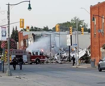 An explosion in downtown Wheatley brings a building down to rubble. BlackburnNews.com file photo by Kari Matheson. 