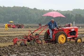 Tractor plowing through field. (Photo courtesy www.plowingmatch.org)