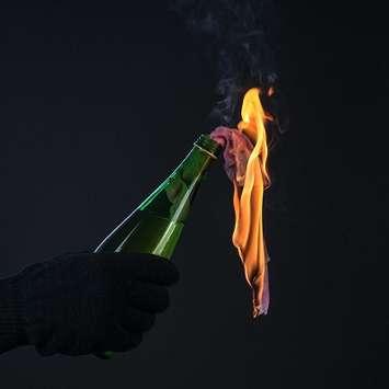 Stock photo of a molotov cocktail. (© Can Stock Photo / Smit)