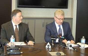 Windsor lawyer Greg Monforton and Michigan lawyer Robert Darling address the media after a 2013 fatal crash on I-75 in Detroit.  (Photo by Maureen Revait.)