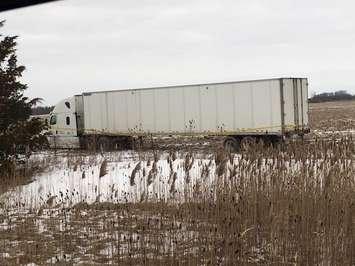 Transport truck in ditch on Hwy. 401. (Photo provided by Chatham-Kent OPP). 