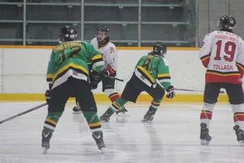 The Wallaceburg Lakers face off against the Blenheim Blades, January 21, 2015.  (Photo courtesy of Jocelyn McLaughlin)