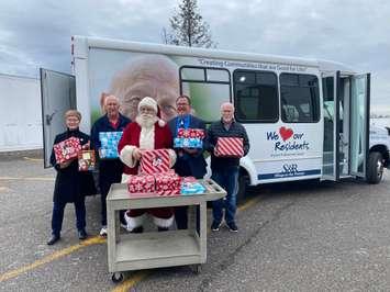Volunteers deliver gifts and cards to seniors in Chatham-Kent in 2022. (Photo courtesy of Dava Robichaud and Emma Longbottom, co-chairs of Santa for Seniors)