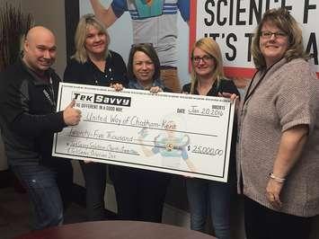Officials from TekSavvy Solutions (L to R) Pierre Aube, Shannon Bell, Christine Havens, and Candice Pletsch, present a cheque to Kelly Bayda for the 2015 United Way campaign. (Photo by Mike James)