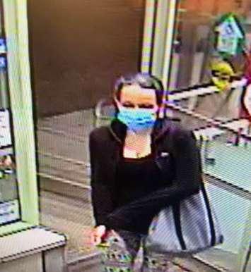 Chatham-Kent police are looking for this woman in connection with a robbery at the Shoppers Drug Mart on St. Clair Street in Chatham. (Photo courtesy of Chatham-Kent police)