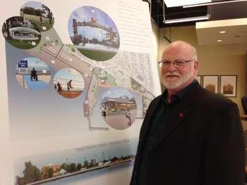 Leamington Mayor John Paterson stands by a conceptual drawings of a proposed development for the town's waterfront on October 9, 2015. (Photo by Kevin Black)