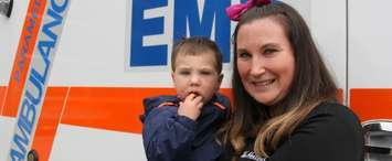 Hunter Margeson, also known as the 401 baby, and Lindsay Margeson return to Chatham for the EMS open house and Barbecue on Wednesday.  (Photo by Michael Hugall)