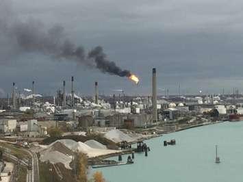A fire in an electrical substation caused black smoke to billow from a flare stack at Imperial Oil Oct. 29, 2014. (Submitted photo by Brandon Vale)