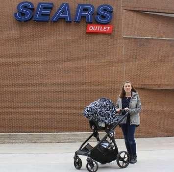 May Fuhrman with daughter in front of closed Sears outlet at Downtown Chatham Centre. October 31, 2017. (Photo by Sarah Cowan Blackburn News Chatham-Kent). 