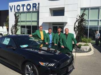 Organizers and sponsors of the Fabulous Festival of Golf tournament pose for a photo in front of a new Ford Mustang that  will be offered as a door prize at the event in September. From left, Darrin Canniff, Dave Matteis, Mike Grail and Don 'Sparky' Leonard. (Photo courtesy of Shelby Sanchuk)