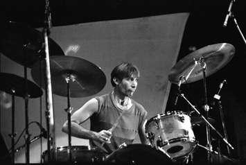 The Rolling Stones Charlie Watts 2 - Rupp Arena, Lexington Kentucky [December 11, 1981]" by michael conen is licensed under CC BY-SA 2.0