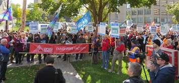 Striking faculty from Fanshawe College rally outside of Deputy Premier Deb Matthews' constituency office on Piccadilly St., October 26, 2017. (Photo by Miranda Chant, Blackburn News)