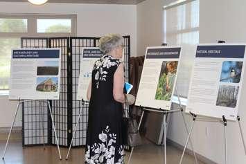 Residents looking at information boards set up during the Otter Creek Wind Farm public meeting at the Baldoon Golf and Country Club. July 19, 2016. (Photo by Natalia Vega)