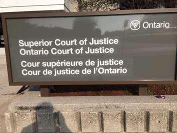 Sign outside of the court in Chatham, ON. Sept 25, 2017. (Photo by Paul Pedro)