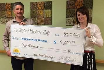 Chris McLeod presents a cheque to Chatham-Kent Hospice Director of Development Jodi Maroney. (Photo courtesy of Chris McLeod)