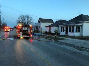 Fire crews on scene of a house fire on Sandys St in Chatham, April 8, 2018. Photo courtesy Chatham-Kent Fire Department/Twitter.