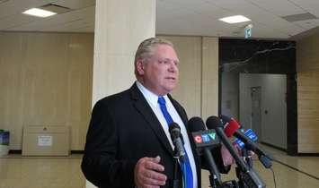 Doug Ford speaks to reporters on a stop in London, March 5, 2018. (Photo by Miranda Chant, Blackburn News)