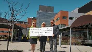 Mary Lou Crowley, Executive Director, Foundation of Chatham-Kent
Health Alliance, receives $10,000 from Tricia and Mike Montminy towards the purchase
of new diagnostic imaging equipment for Chatham-Kent Health Alliance. (Photo courtesy of the Foundation of the CKHA)