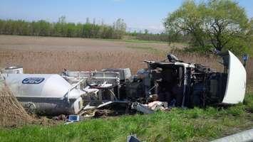 A transport truck in the WB ditch of Hwy. 401, May 13, 2016 (Photo courtesy of Chatham-Kent OPP)
