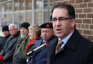 Windsor West NDP MP Brian Masse speaks to a crowd outside of Windsor's Veterans Affairs Canada office, January 31, 2014.