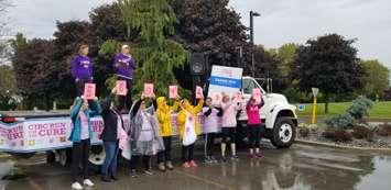 Run Directors Heather Burk and Melissa Brooks, along with volunteers, announce the fundraising total at the 2019 CIBC Run for the Cure event in Chatham-Kent.  October 6, 2019. (Photo by Cheryl Johnstone).